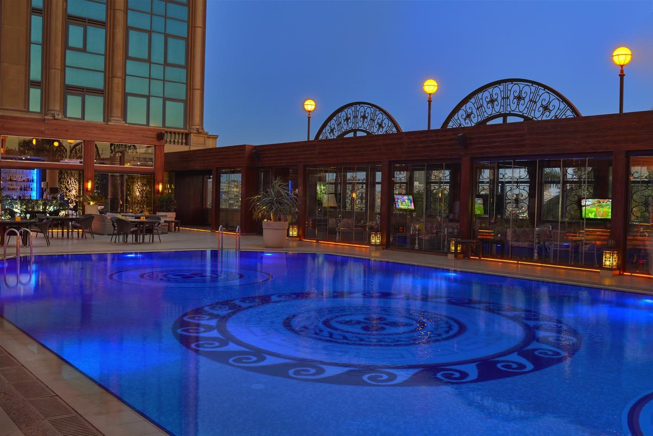 Four Seasons Cairo At The First Residence Giza Exterior foto The pool at the hotel